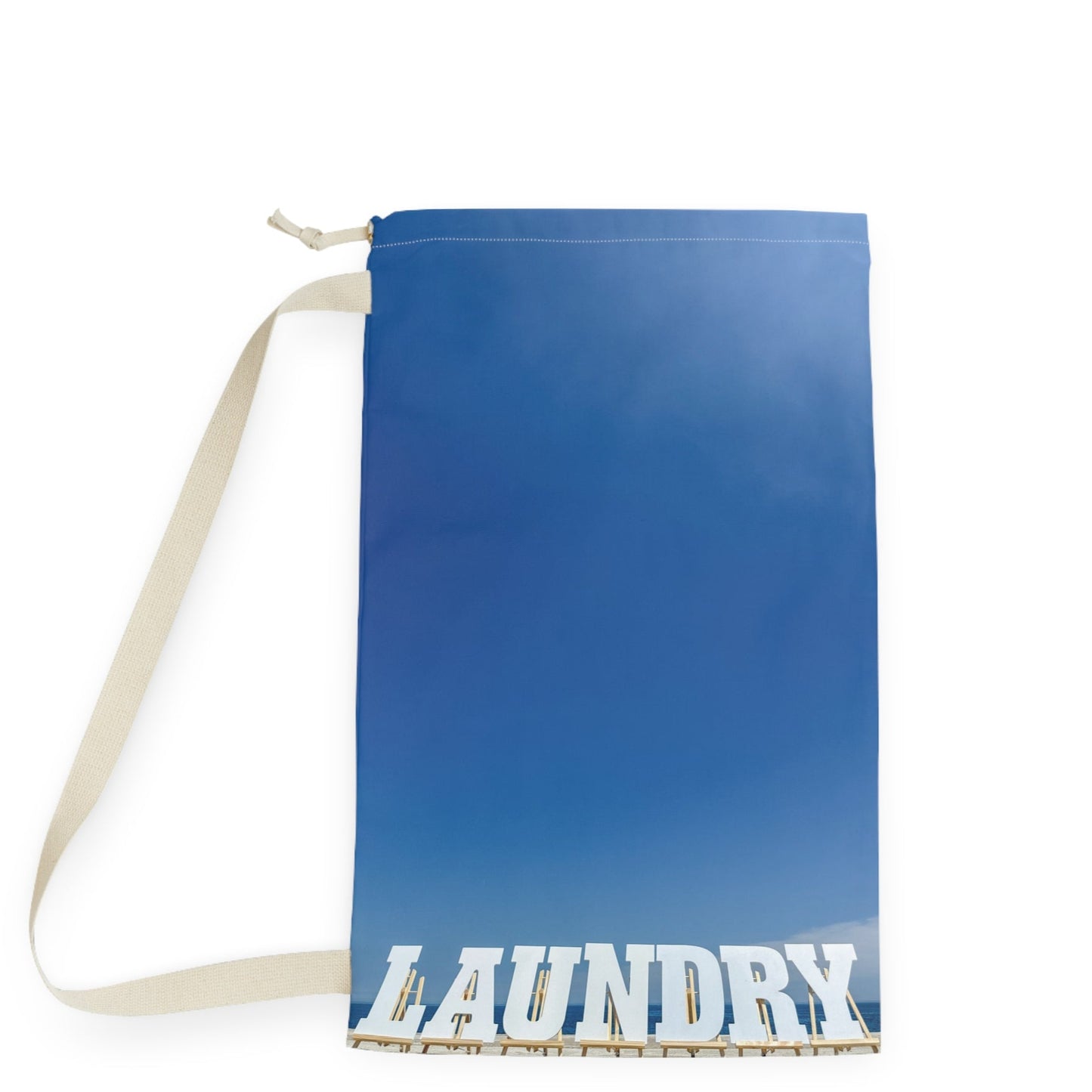 Laundry bag with shoulder strap and drawstring. Allover same print on both sides. "18 x 29". Shoreline Laundry Day".