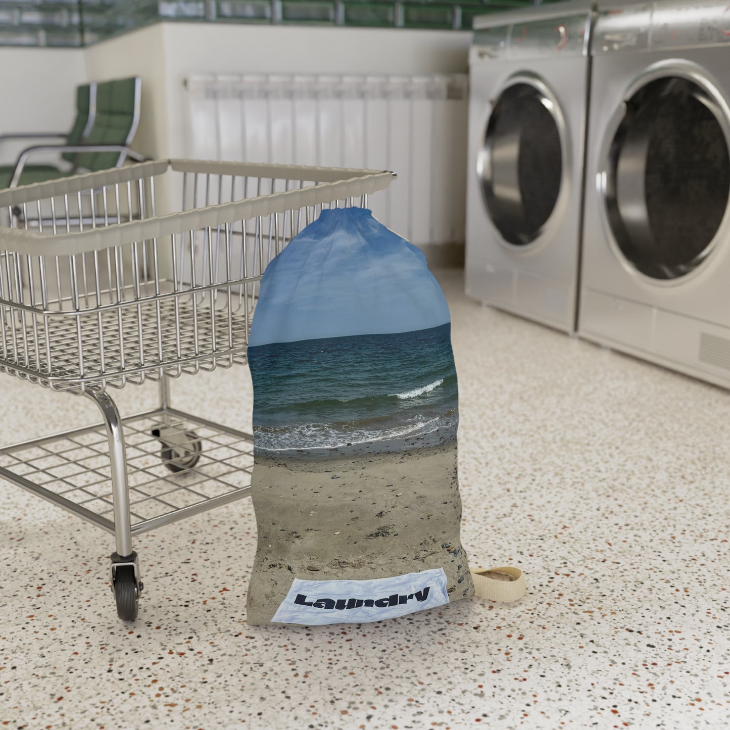 Laundry bag with shoulder strap and drawstring. Allover same print on both sides. "18 x 29". Seaside Laundry Day".