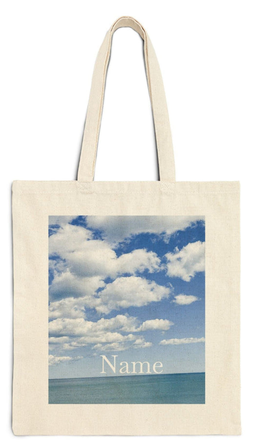 personalized bridesmaid tote bag in natural color cotton canvas seaside bright clouds design