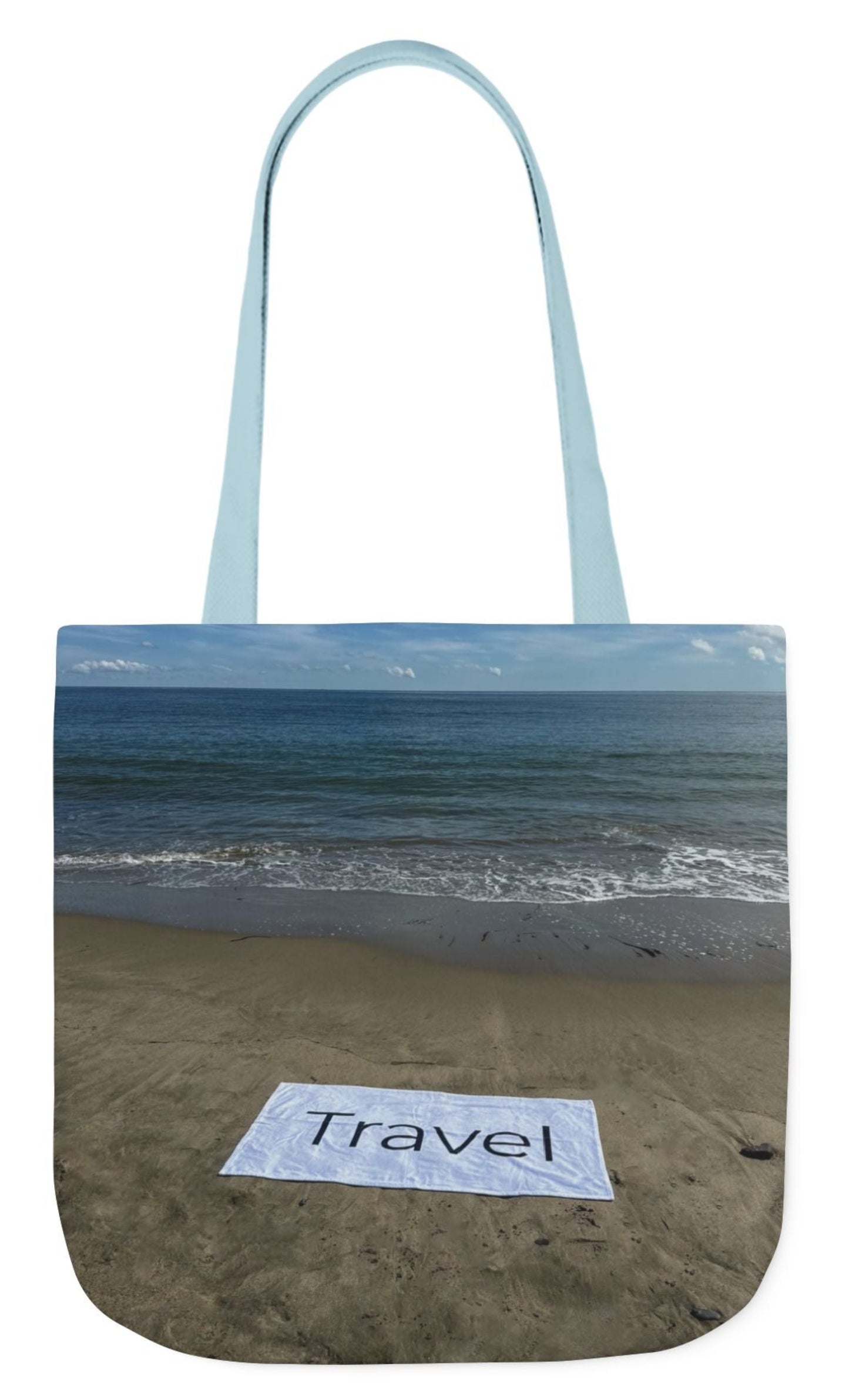 travel tote bag with blue handles and same beach scene on each side.