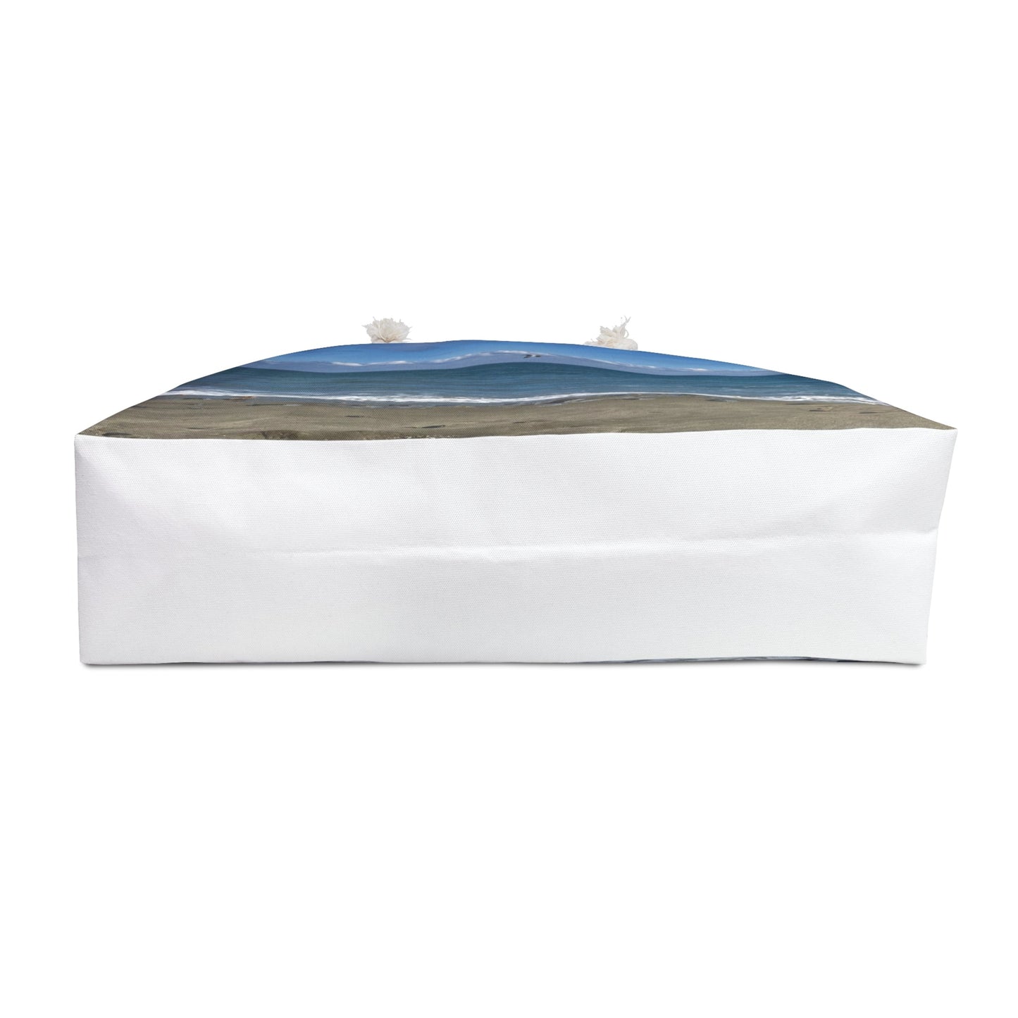 bottom of weekender beach themed travel bag with rope handles