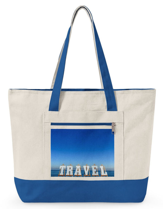 travel tote bag with blue highlights and zippers